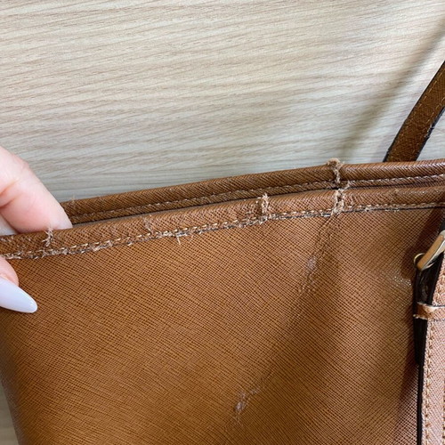 Michael Kors bag used with wear on the trim