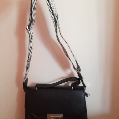 Black shoulder bag like new with detachable black and white strap