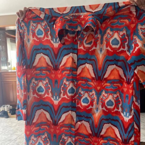 Women's shirt like new with blue, orange and white details, size large - extra large