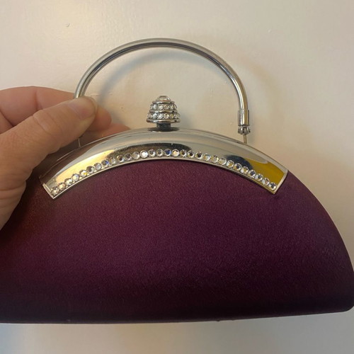 Evening handbag with extra chain for crossbody wear