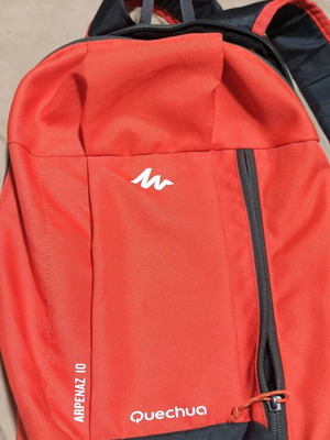 Quechua Arpenaz 10-liter backpack like new, red