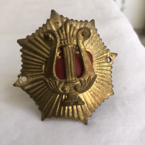Metal badge of philharmonic musician's cap, like new