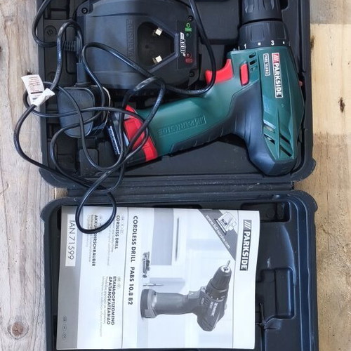 Parkside cordless drill used with charger and manual