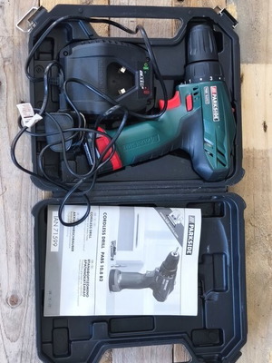 Parkside cordless drill used with charger and manual