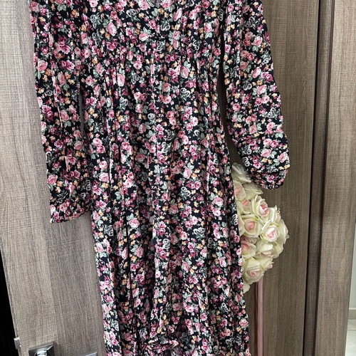 Dress used, size S, longer at back with floral pattern