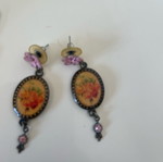 Earrings with flower design used
