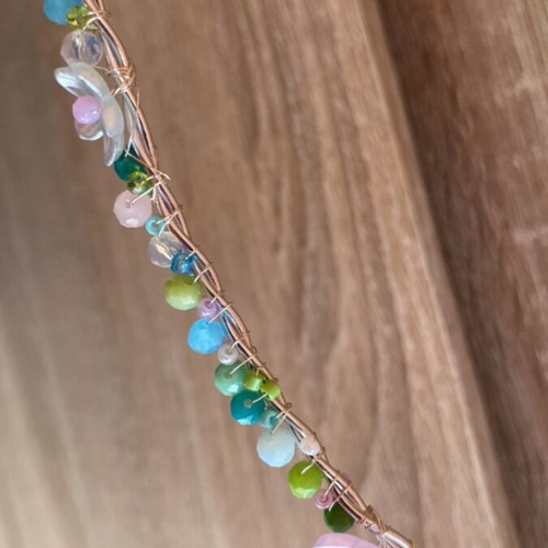 Handmade wire crown with colorful beads and flower details