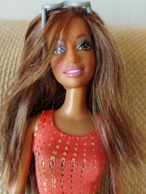 Barbie doll by Mattel like new with denim skirt and gold details