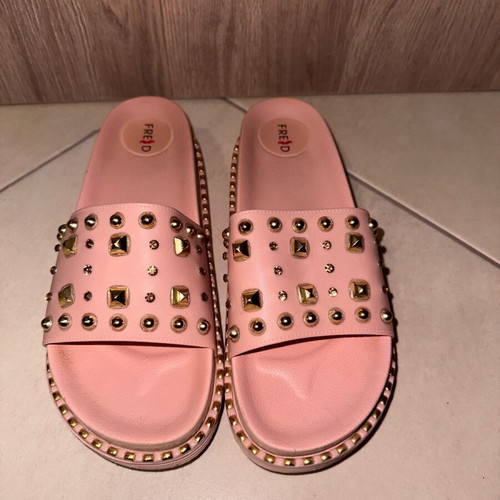 Keep Fred pink soft slippers like new with gold studs