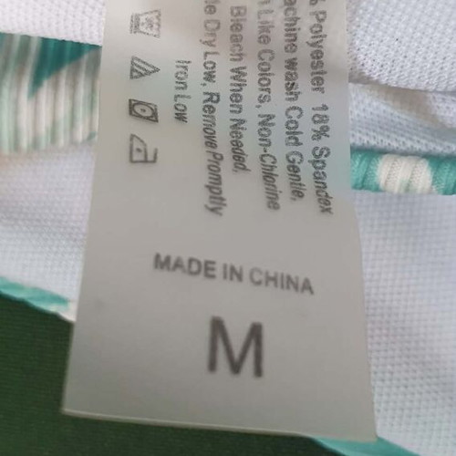 Shein swimsuit medium with beautiful daisies like new, white and green
