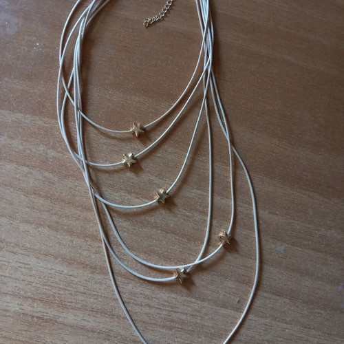 Star Necklace with Beige Cord and Multiple Layers Like New