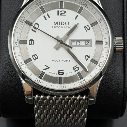 Mido automatic men's watch like new, silver color with box and strap