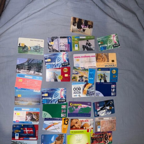 Phone cards and time cards used, collection of 29 from various countries