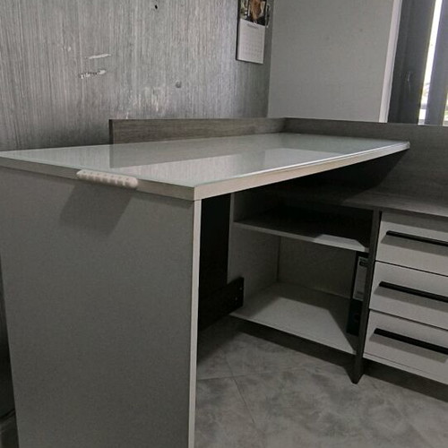 Corner desk used with glass work surface