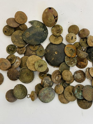 Antiques collection of very old metal military buttons used