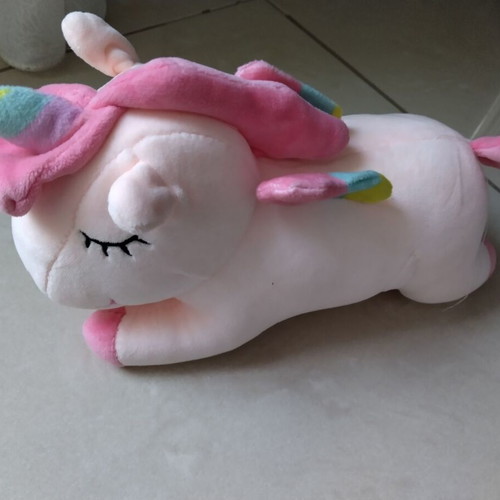 Plush unicorn in pastel colors like new