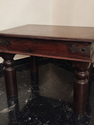 Solid wood coffee table like new with metal details