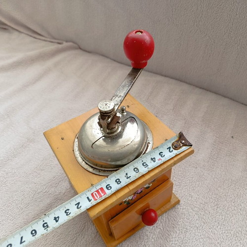 Manual coffee grinder used, vintage personal item