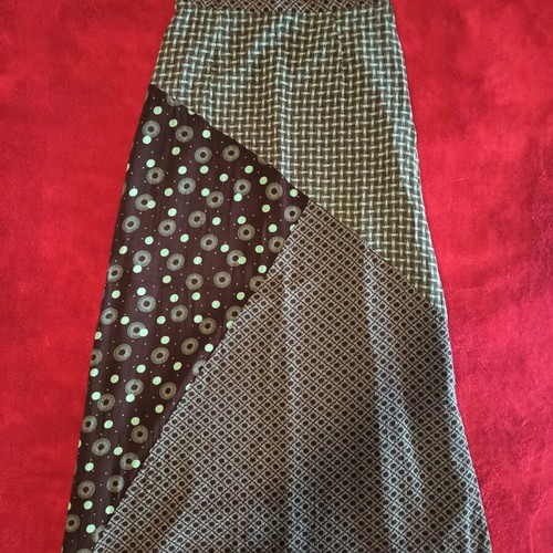Trafaluc skirt like new with unique patterns, size XS-S, brown and green