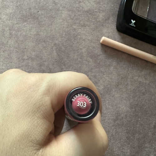 Wet and Wild eyeshadow palette and assorted lip products