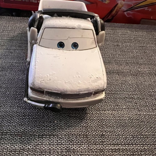 Disney Pixar Cars Brian Fee Clamp #1 Piston Cup Reporters Deluxe 2016 Mattel like new