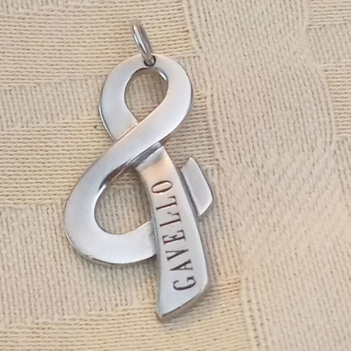 Very Gavello white gold pendant 9k used, treble clef design
