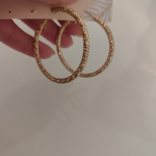 Earrings in gold color like new, medium size hoops