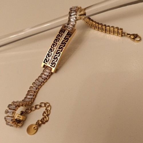 Bracelet and ring set made of steel with archaic design and rhinestones, new, gold