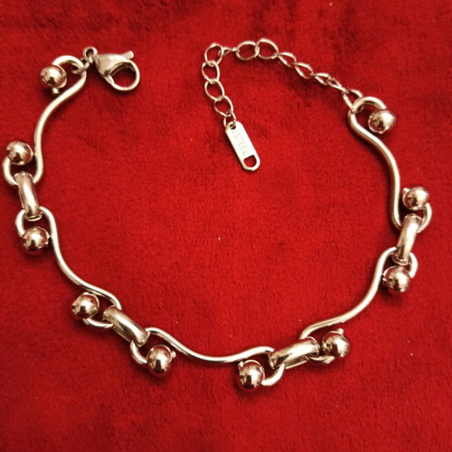 Stainless steel bracelet new, silver with intricate fastening