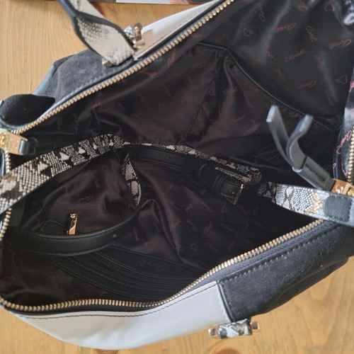 Axel shoulder-hand bag black with white and animal print snake like new