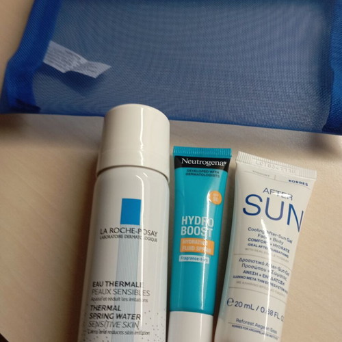 Sun protection beach pouch with sun and after sun creams new