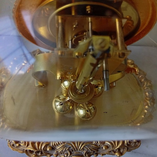 400-day mechanical clock with glass dome