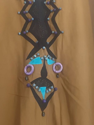 Vintage dress with tiki design used, khaki with beads