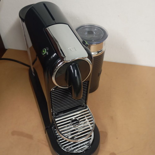 Delonghi Nespresso coffee machine with milk frother