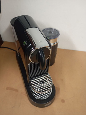 Delonghi Nespresso coffee machine with milk frother