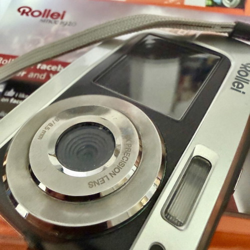 Rollei Sportsline 62 Dual Orange digital camera like new, waterproof 3m