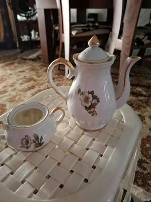 Small porcelain teapot with sugar bowl like new