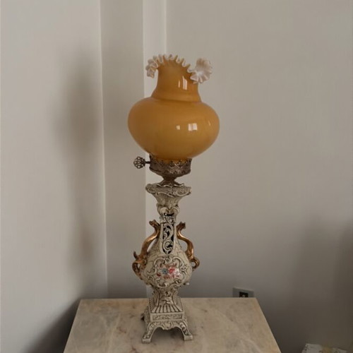 Vintage table lamps used, porcelain base with orange glass shade