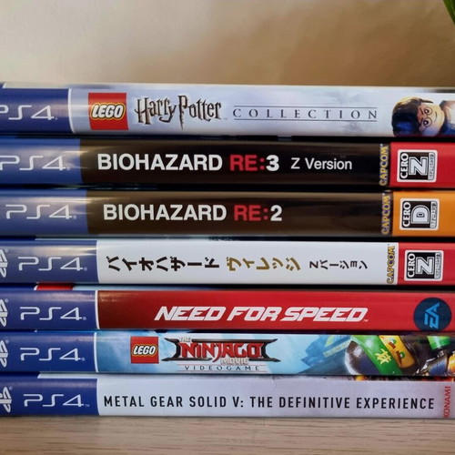 PS4 games pack of 7 used, 2 sealed (RE2 and Village)