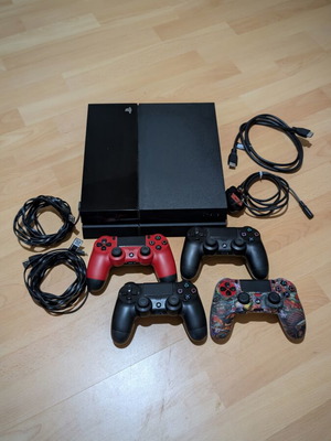 PS4 Slim console with 5 controllers and games