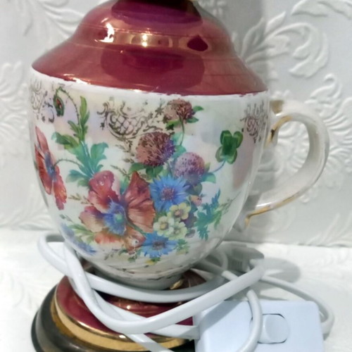 Electric ceramic vintage lamp used with floral decoration
