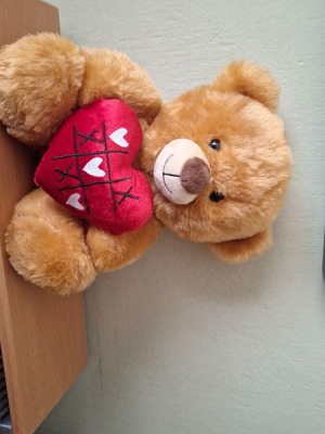 Stuffed teddy bear with heart