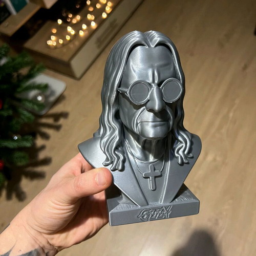 Ozzy figure silver like new