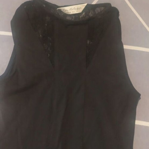 Black top with lace details like new, tight fit