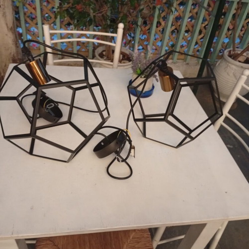 Two rhombic metal ceiling lights