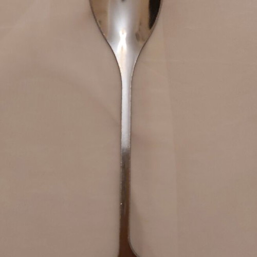 Set of 6 stainless steel spoons with leaf design like new