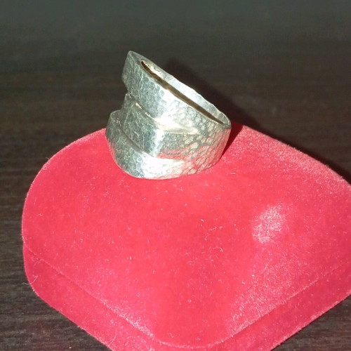 Asymmetric hammered 925 silver ring like new, size 57