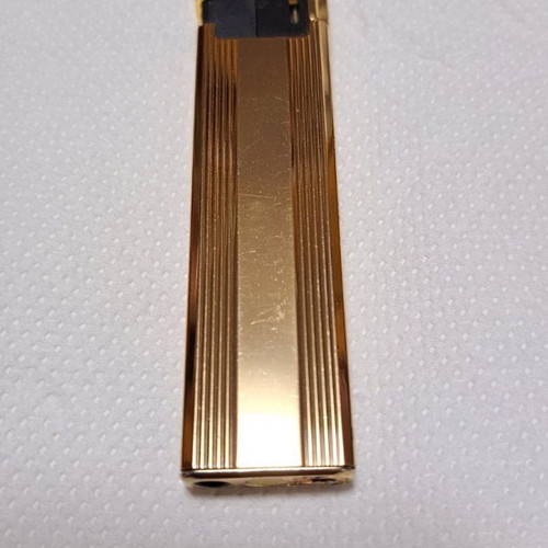 Ted Lapidus lighter used, gold plated