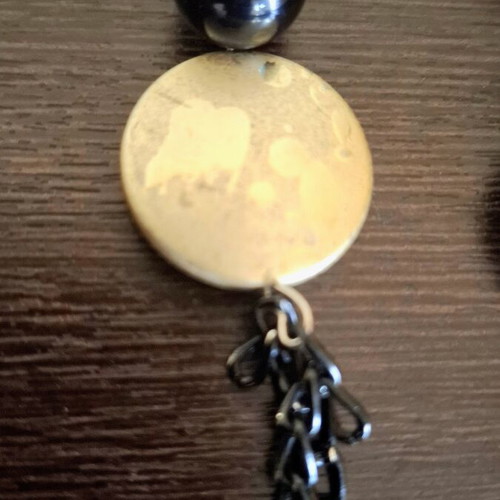 Necklace with diamond cut black chain and gold discs like new