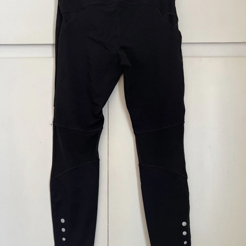 Black leggings like new with design and transparent details, size L